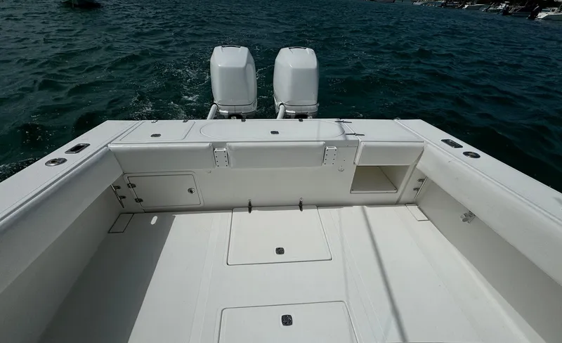 Slide: The Image of 2006 Venture 34 Open boat with dual engines on a calm sea. - 18