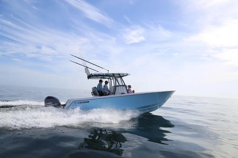 The Image of 2025 Contender 30 Tournament boat cruising on calm ocean waters. - 1