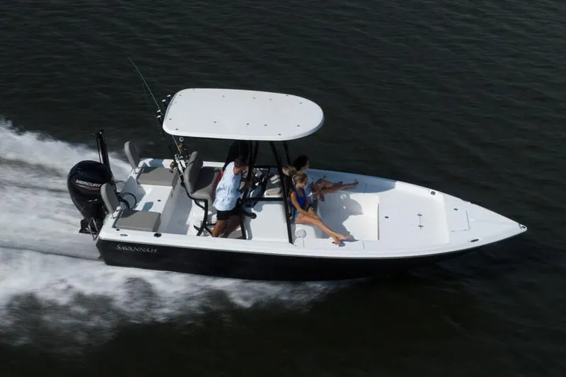 Slide: The Image of 2025 Savannah 210X boat deck with storage compartments and measuring scale. - 4