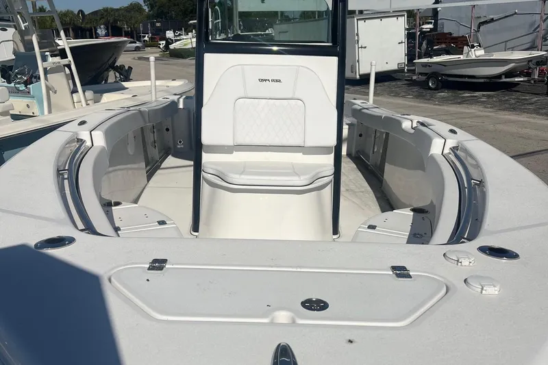 Slide: The Image of 2024 Sea Pro 242 Center Console boat, featuring spacious seating and modern design. - 3