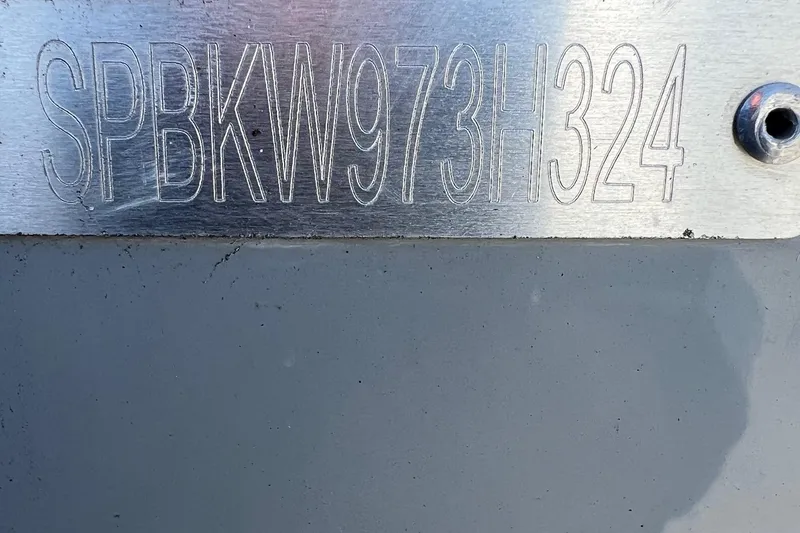 Slide: The Image of 2024 Sea Pro 242 Center Console hull identification number on metal plate. - 6