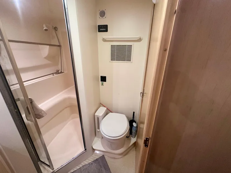 Slide: The Image of 1997 Carver 350 Mariner bathroom with shower and toilet, compact and functional design. - 37