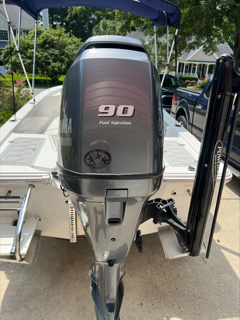 Slide: The Image of Outboard motor on 2016 Sportsman Island Bay 18 boat, featuring 90 HP fuel injection. - 7