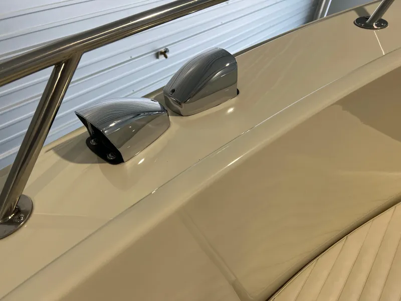 Slide: The Image of 1974 Chris-Craft Dory boat detail with chrome fixtures and railing. - 23