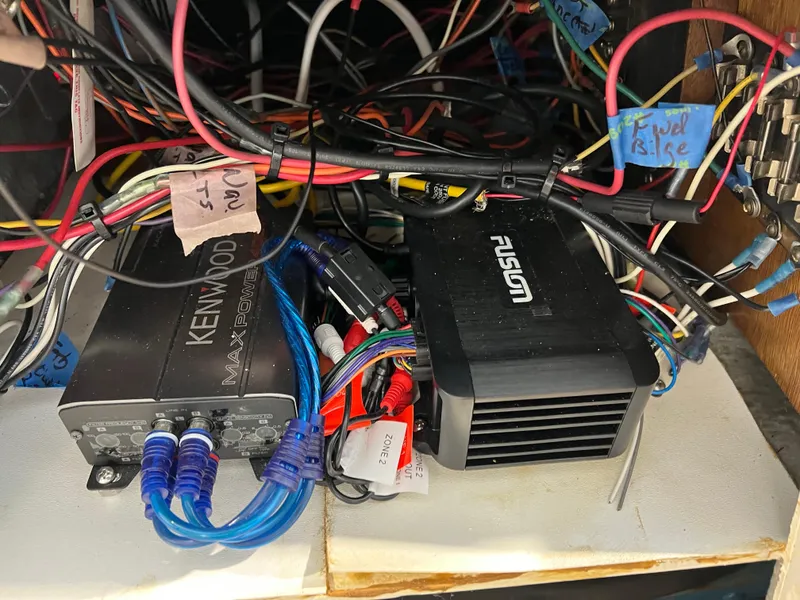 Slide: The Image of Wiring setup with Kenwood and Fusion audio components in a 1974 Chris-Craft Dory. - 29