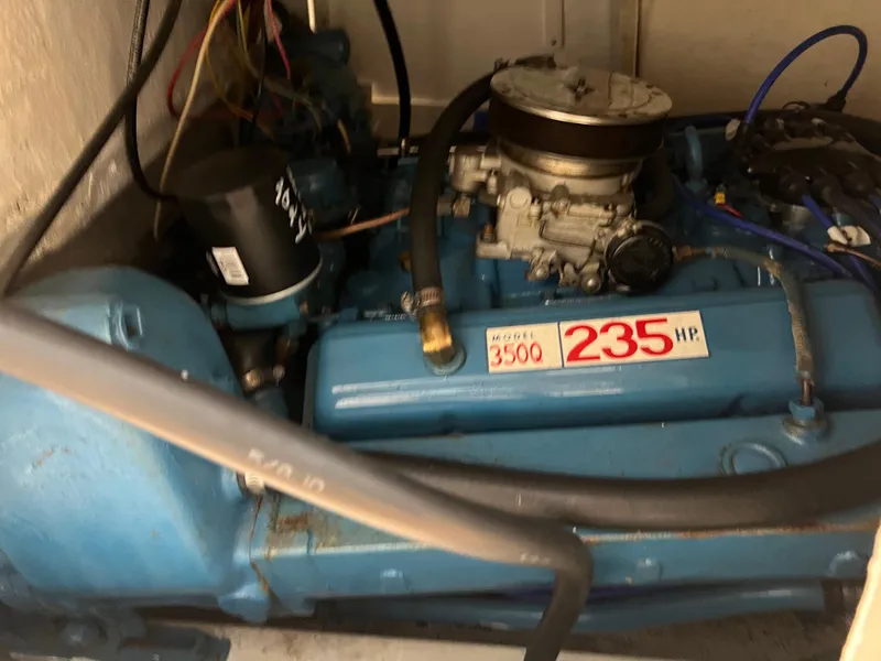 Slide: The Image of 1974 Chris-Craft Dory engine, Model 350Q, 235 horsepower, blue with visible components. - 30