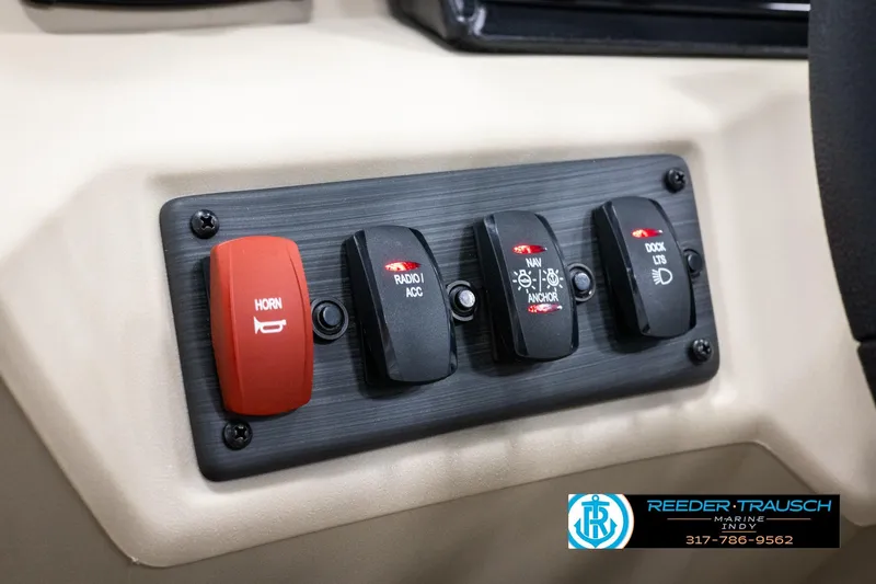 Slide: The Image of Control panel of 2025 Bennington 21 SL boat with labeled switches. - 26