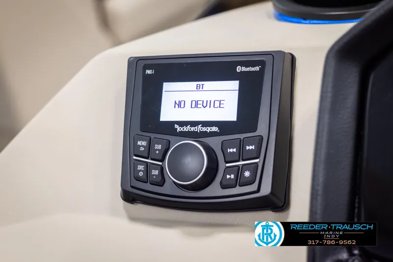 Slide: The Image of Rockford Fosgate Bluetooth stereo on 2025 Bennington 21 SL boat dashboard. - 27