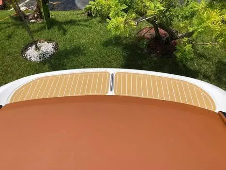 Slide: The Image of Engine compartment of a 1997 Baja 38 boat with Mercury engines visible. - 3