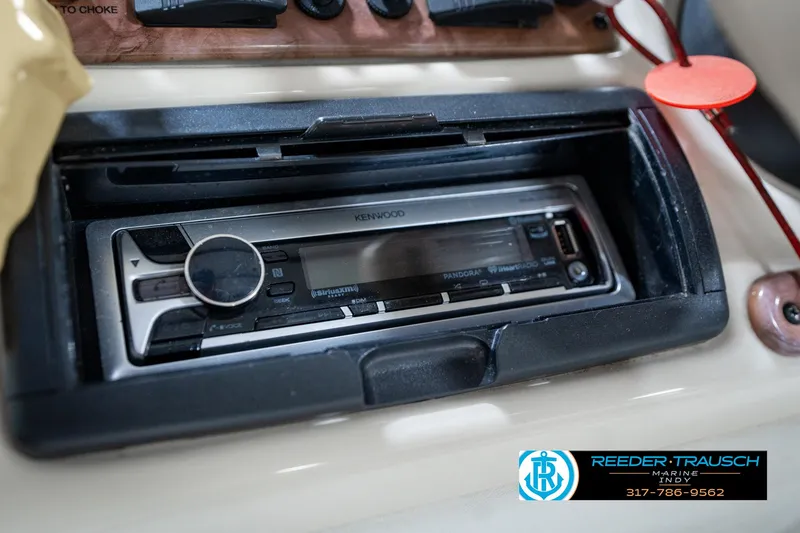 Slide: The Image of Kenwood stereo system in a 2005 Bentley Pontoons 200 CRUISE boat dashboard. - 31