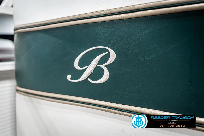 Slide: The Image of 2005 Bentley Pontoons 200 CRUISE logo detail with green and white design. - 37