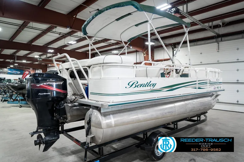 Slide: The Image of 2005 Bentley Pontoons 200 CRUISE boat in showroom, featuring Mercury FourStroke engine. - 7
