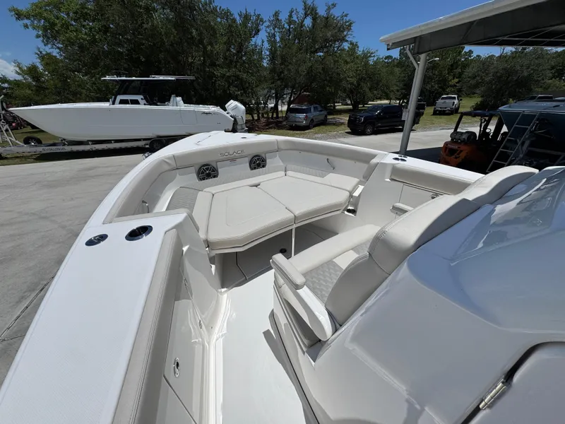 Slide: The Image of 2026 Solace 30 CS boat with spacious seating and modern design. - 19
