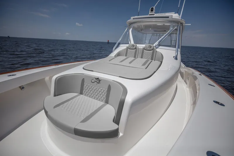 Slide: The Image of 2025 Albemarle 45 Carolinian boat with sleek design and luxurious seating on open water. - 19