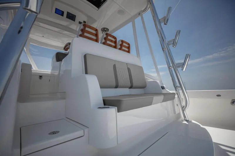 Slide: The Image of 2025 Albemarle 45 Carolinian boat interior with sleek seating and modern design. - 23