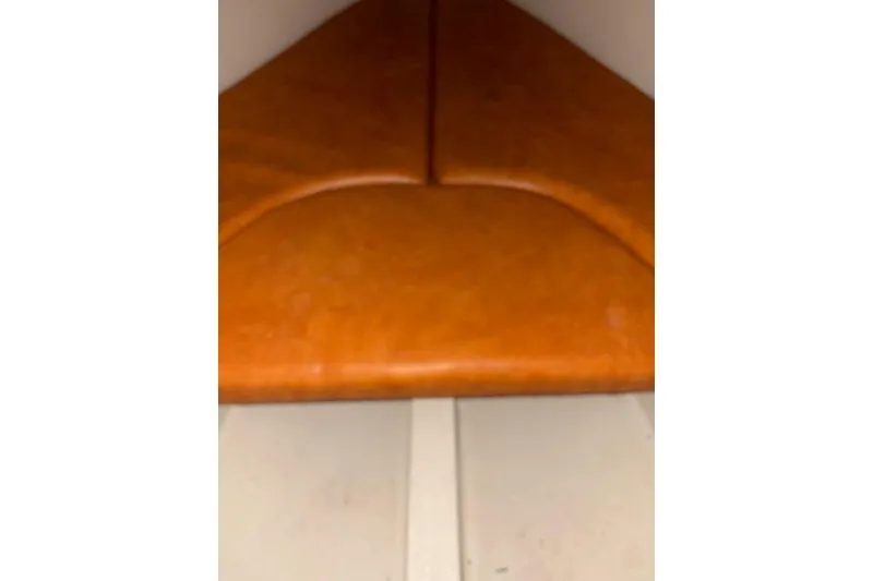 Slide: The Image of Interior view of 1986 O'Day 19 sailboat with orange cushions. - 16