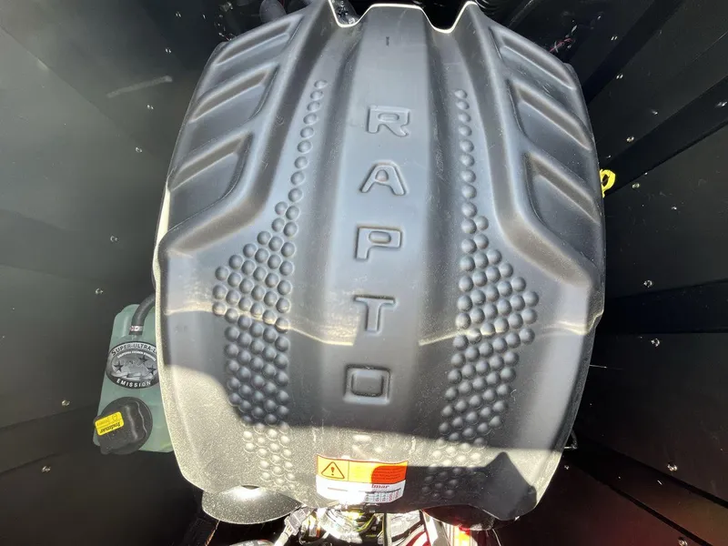 Slide: The Image of 2025 Moomba Tykon engine cover with "RAPTOR" branding, showcasing robust design and detailing. - 20