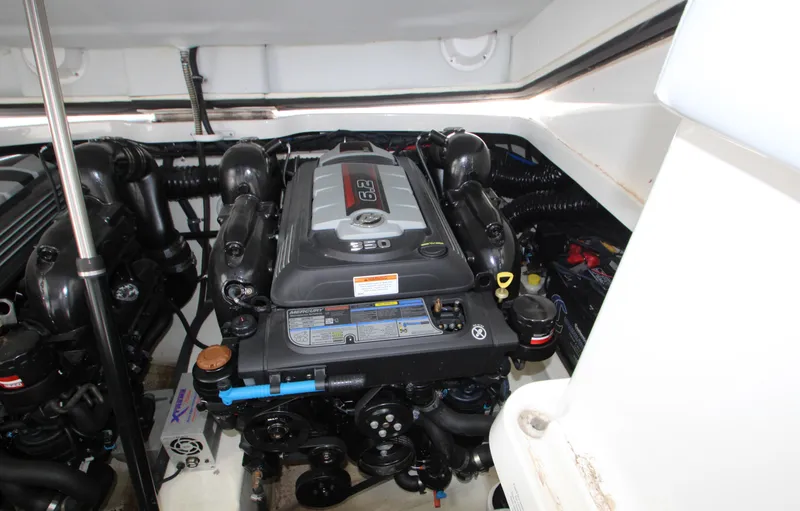 Slide: The Image of Engine compartment of a 2020 Formula 330 Crossover Bowrider, featuring a powerful 6.2L engine. - 24