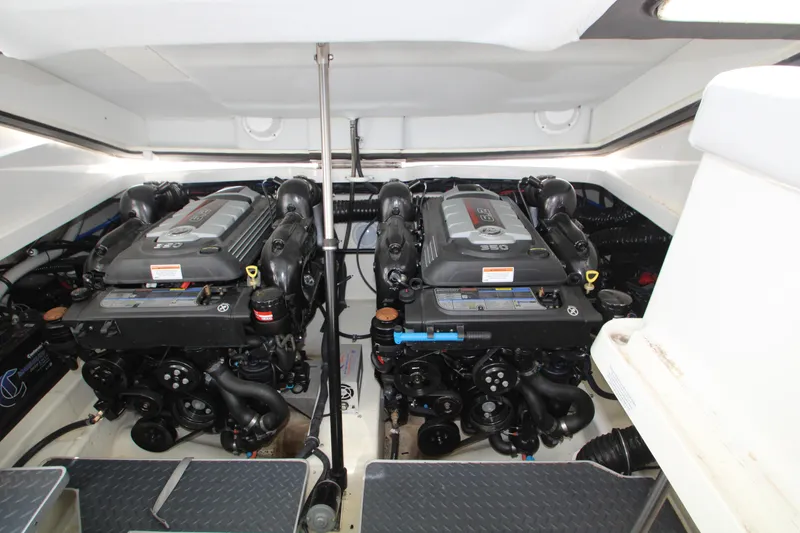 Slide: The Image of Engine compartment of 2020 Formula 330 Crossover Bowrider with dual engines. - 29
