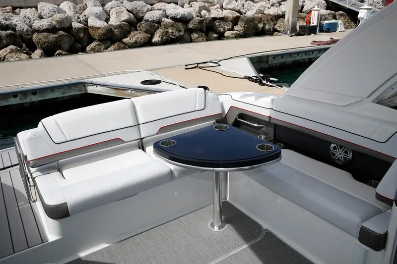 Slide: The Image of Manufacturer Provided Image: 2020 Formula 330 Crossover Bowrider interior seating area with table. - 67