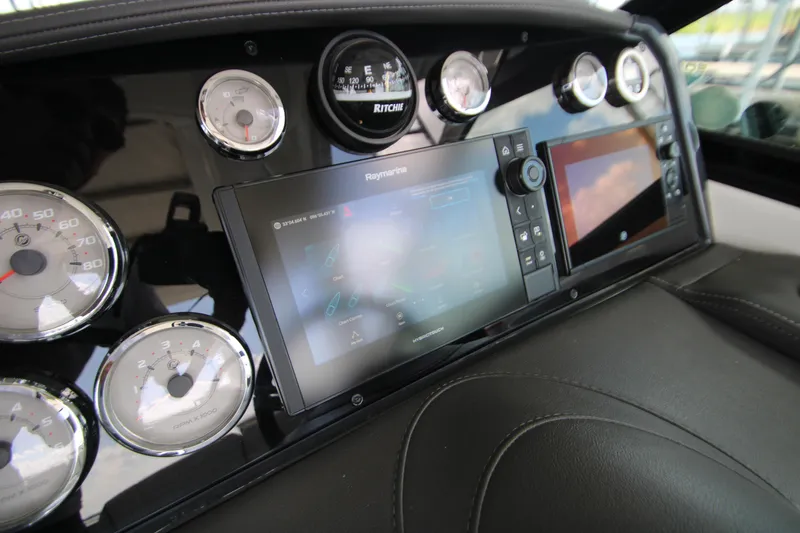 Slide: The Image of 2020 Formula 330 Crossover Bowrider's rear deck overlooking calm water. - 9