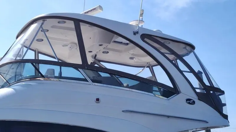 Slide: The Image of 2006 Sea Ray 52 Sedan Bridge yacht with sleek design and modern features. - 13