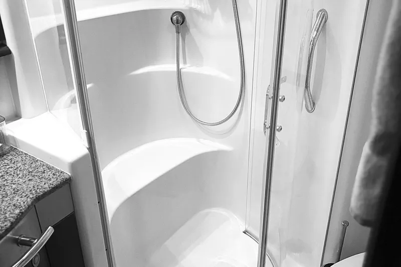 Slide: The Image of Luxurious bedroom interior of 2006 Sea Ray 52 Sedan Bridge yacht with elegant bedding. - 46