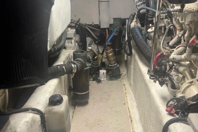 Slide: The Image of Engine room of a 2006 Sea Ray 52 Sedan Bridge yacht, showcasing mechanical components. - 50