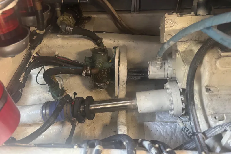 Slide: The Image of Engine compartment of 2006 Sea Ray 52 Sedan Bridge with Reverso oil change system. - 53