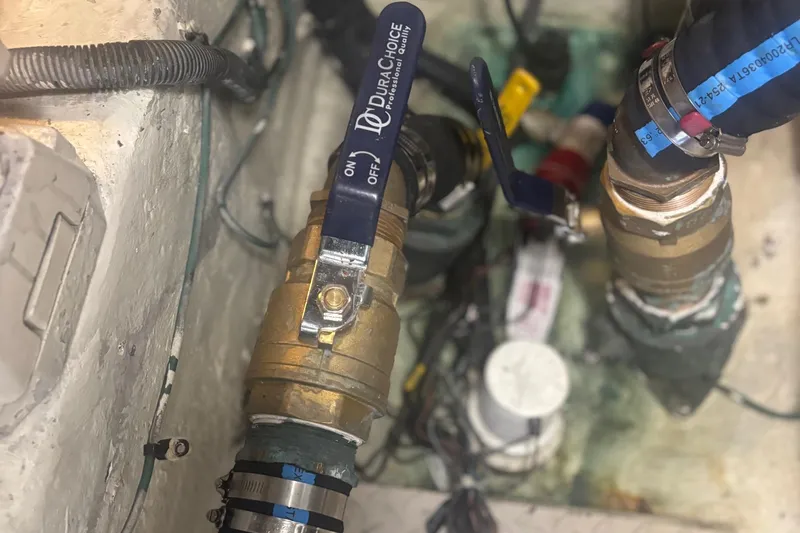 Slide: The Image of Engine room of 2006 Sea Ray 52 Sedan Bridge with Racor fuel filters. - 57