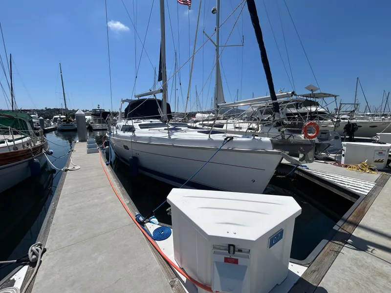 The Image of Sailboat docked at marina, 1998 Hunter Passage 450, clear sky, calm water. - 0