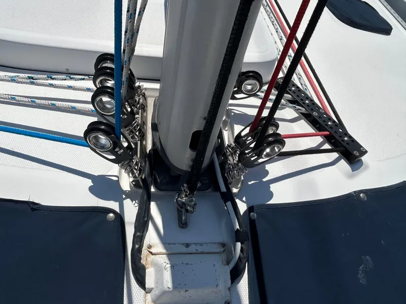 Slide: The Image of Close-up of rigging and pulleys on a 1998 Hunter Passage 450 sailboat. - 10