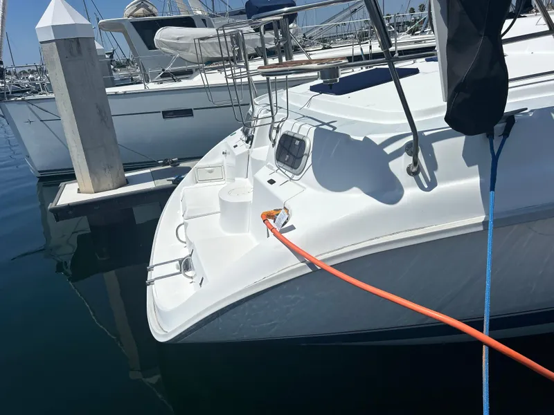 Slide: The Image of Hunter Passage 450 sailboat docked, 1998 model, with power cable connected. - 14