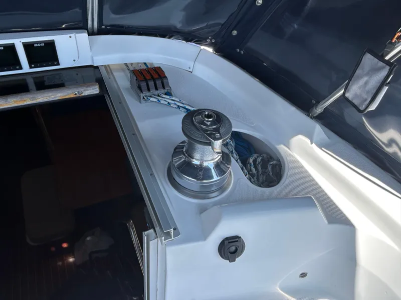 Slide: The Image of Cockpit of 1998 Hunter Passage 450 sailboat with winch and control panel. - 19