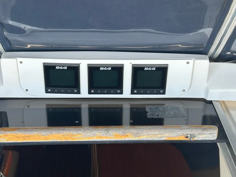 Slide: The Image of B&G navigation displays on 1998 Hunter Passage 450 yacht dashboard. - 20