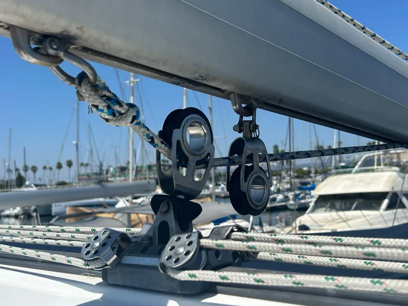 Slide: The Image of Close-up of rigging on a 1998 Hunter Passage 450 sailboat in a marina. - 4