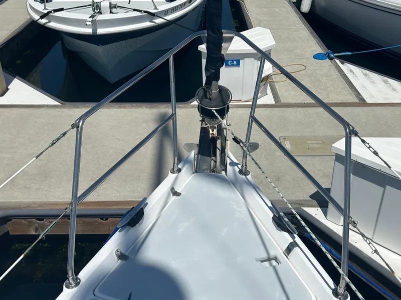 Slide: The Image of Bow of 1998 Hunter Passage 450 sailboat docked at marina. - 8