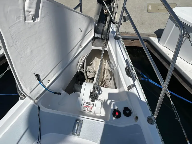 Slide: The Image of Anchor locker of 1998 Hunter Passage 450 sailboat with winch and rope. - 9