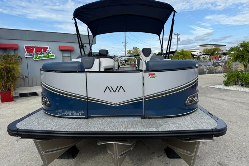 Slide: The Image of 2025 Avalon LSZ Quad Lounger 24' Tri Toon High Performance boat at dealership. - 27