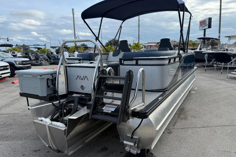 Slide: The Image of 2025 Avalon LSZ Quad Lounger 24' Tri Toon High Performance boat at dealership. - 30