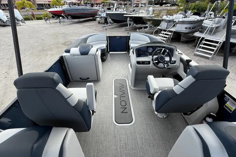 Slide: The Image of 2025 Avalon LSZ Quad Lounger interior with plush seating and modern dashboard. - 37