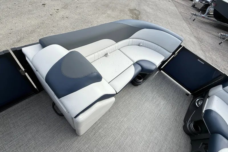Slide: The Image of 2025 Avalon LSZ Quad Lounger interior with sleek, modern seating on a Tri Toon boat. - 39