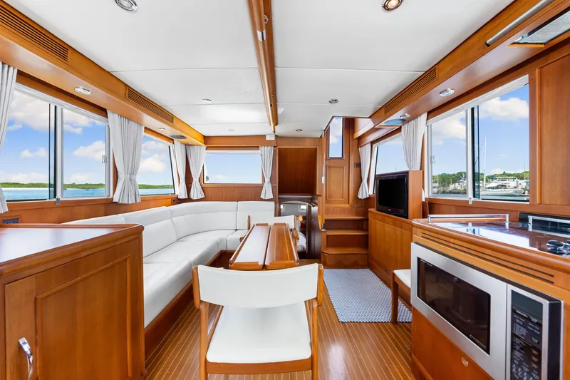 Slide: The Image of Luxurious interior of 2008 Grand Banks 47 Classic yacht with elegant wood finish and modern amenities. - 40