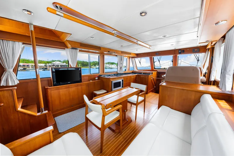 Slide: The Image of Luxurious interior of 2008 Grand Banks 47 Classic yacht with wood finish and modern amenities. - 42