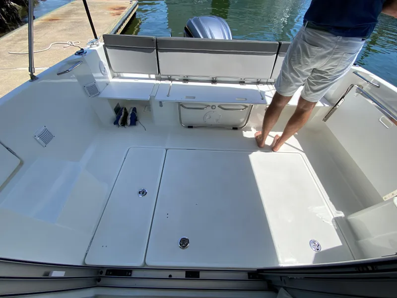 Slide: The Image of 2023 Jeanneau NC Weekender 795 Series 2 boat interior with seating and storage. - 14