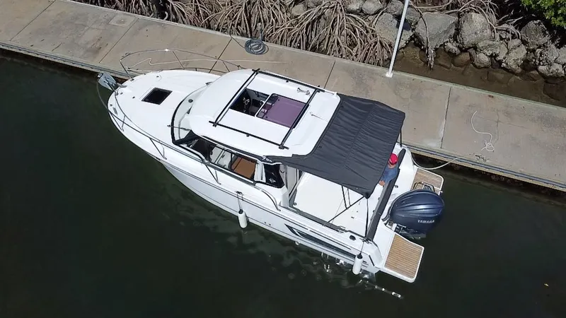 Slide: The Image of 2023 Jeanneau NC Weekender 795 Series 2 boat docked, aerial view. - 9