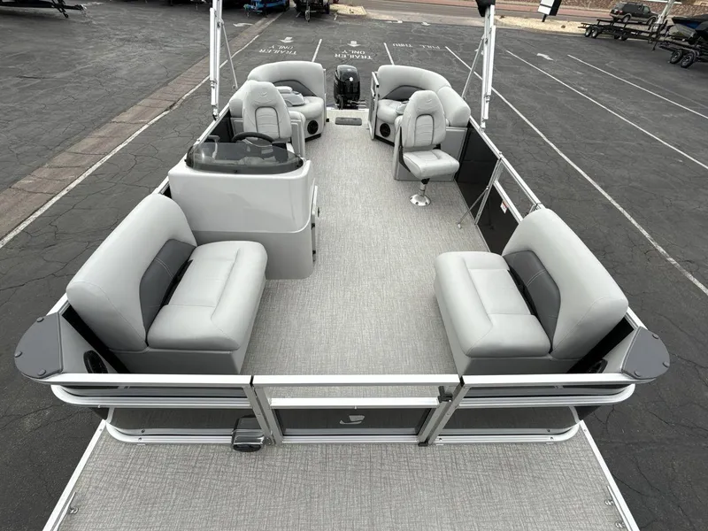 Slide: The Image of 2025 Landau Island Breeze 19 C pontoon boat with spacious seating and modern design. - 12