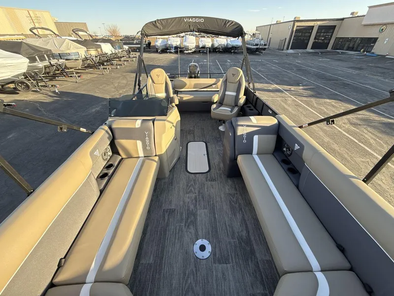 Slide: The Image of 2025 Viaggio x24s pontoon boat interior with spacious seating and modern design. - 12