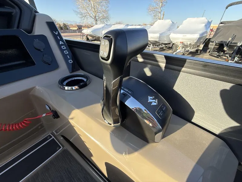 Slide: The Image of Viaggio x24s 2025 boat throttle control in cockpit, featuring sleek design and modern controls. - 16