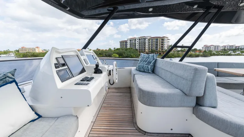 Slide: The Image of Luxurious 2016 Monte Carlo Yachts MCY 65 interior with modern helm and plush seating. - 13
